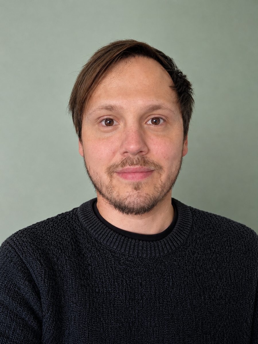 Ryan Maguire, integrative counsellor, seated in a therapy room